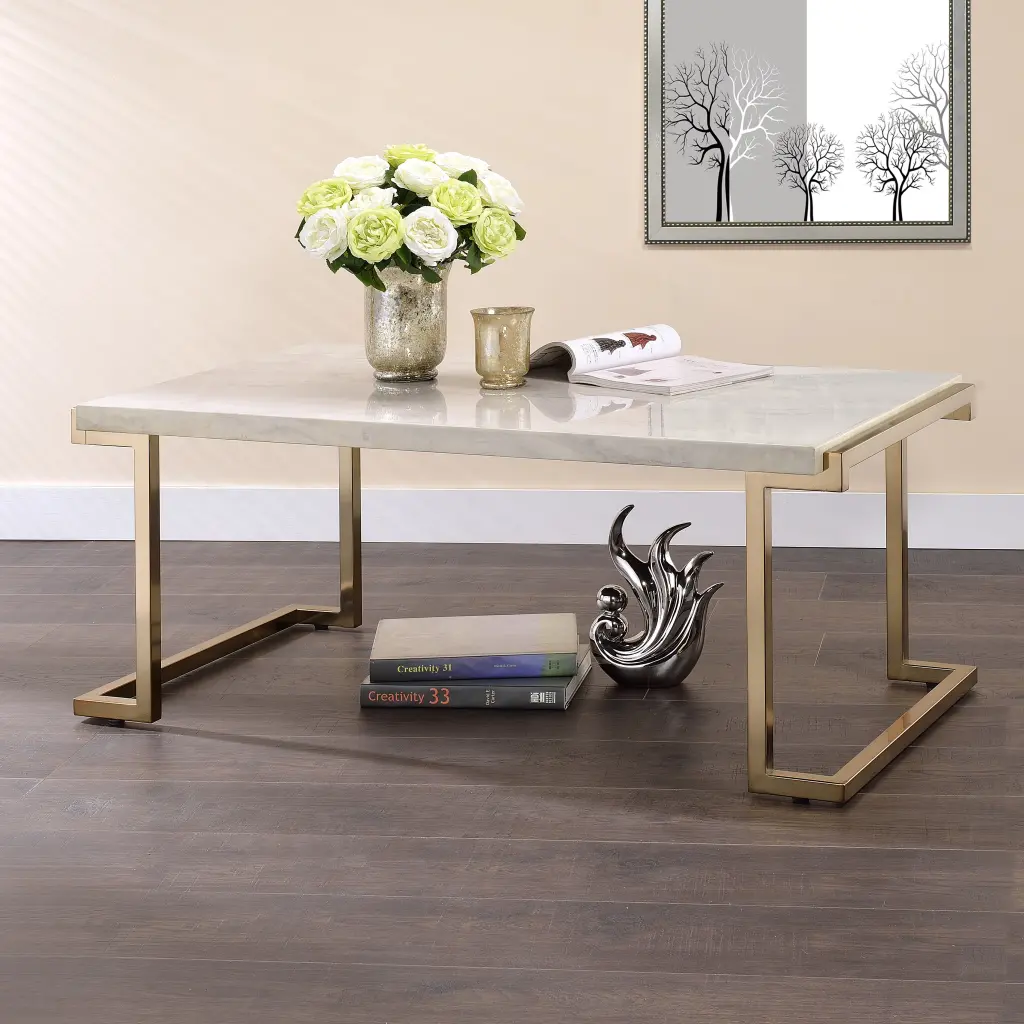 White and Champagne Sled Base Coffee Table Precious Metal Primary Living furniture max